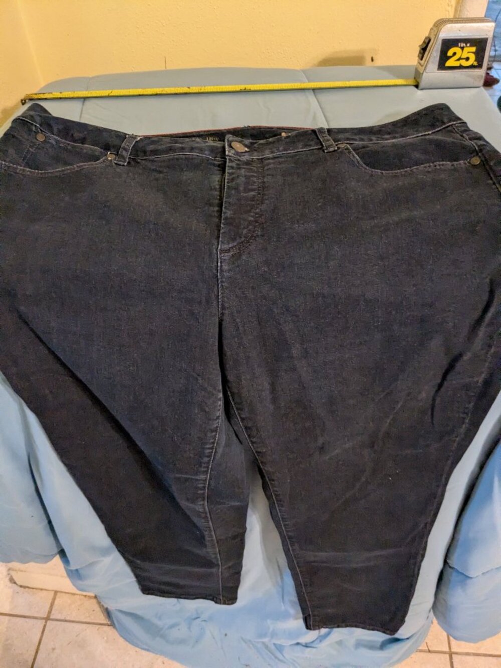 Nice dark blue jeans that stretch.